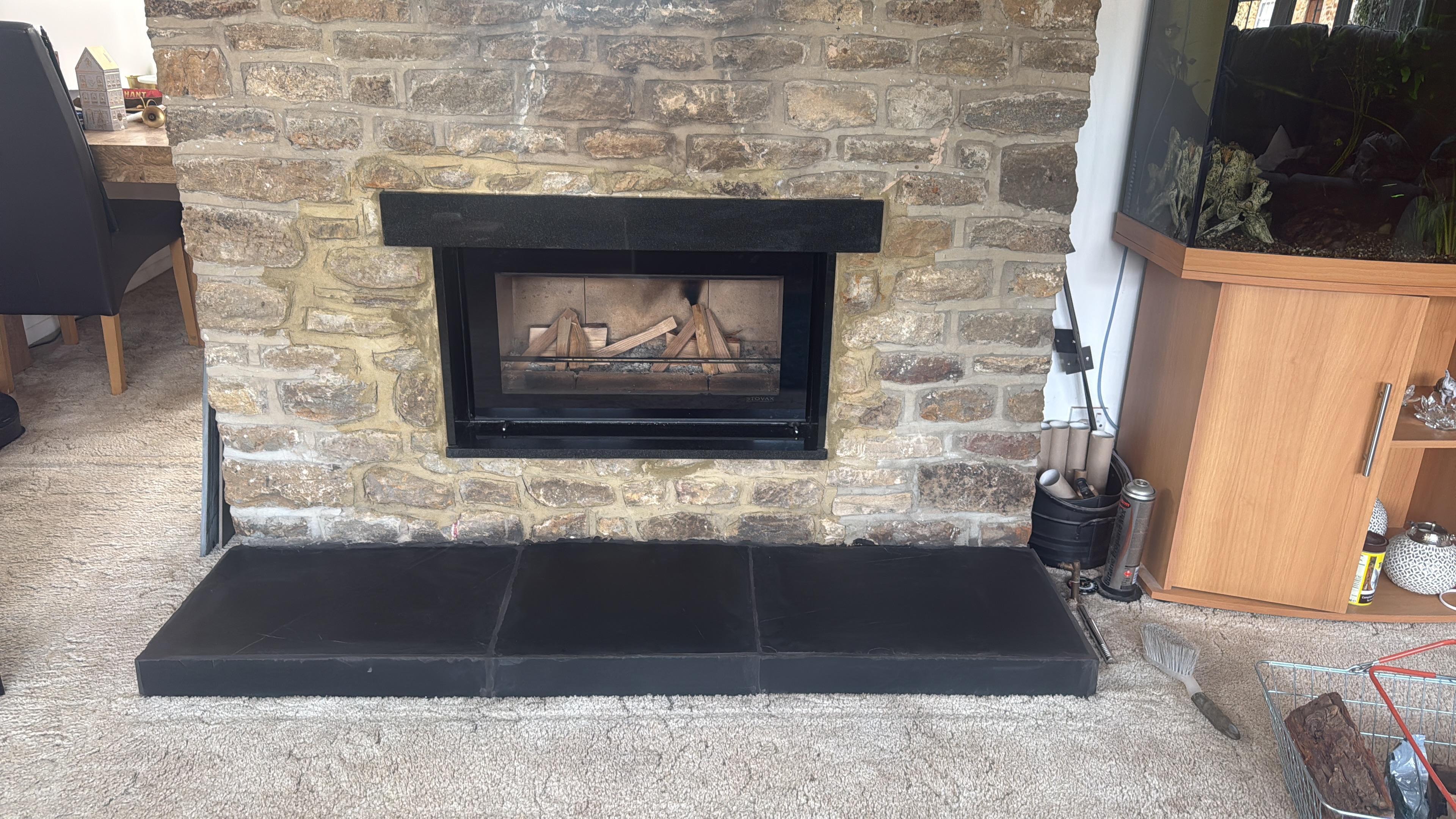 Stone fireplace install — after